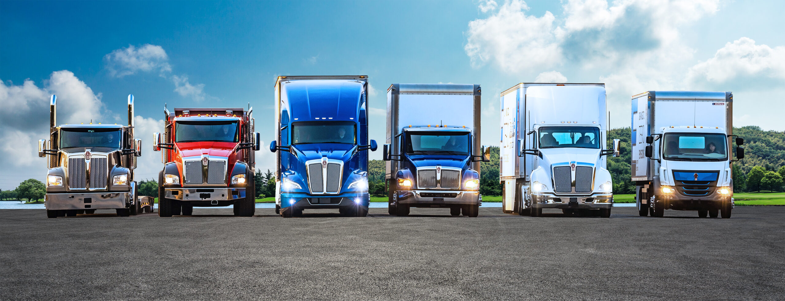 Lineup of six Kenworth trucks