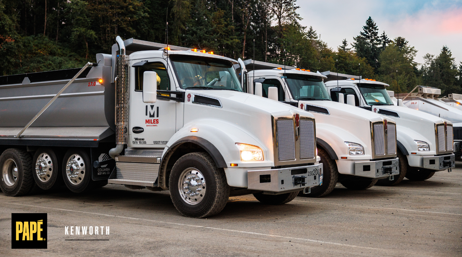 Kenworth T880 trucks in operation at a busy jobsite highlighting uptime and performance