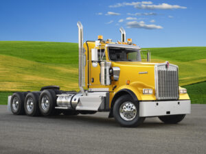 Kenworth W900L day cab truck configured for regional hauling and vocational transportation applications